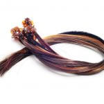 hair extensions of different colors on a white background